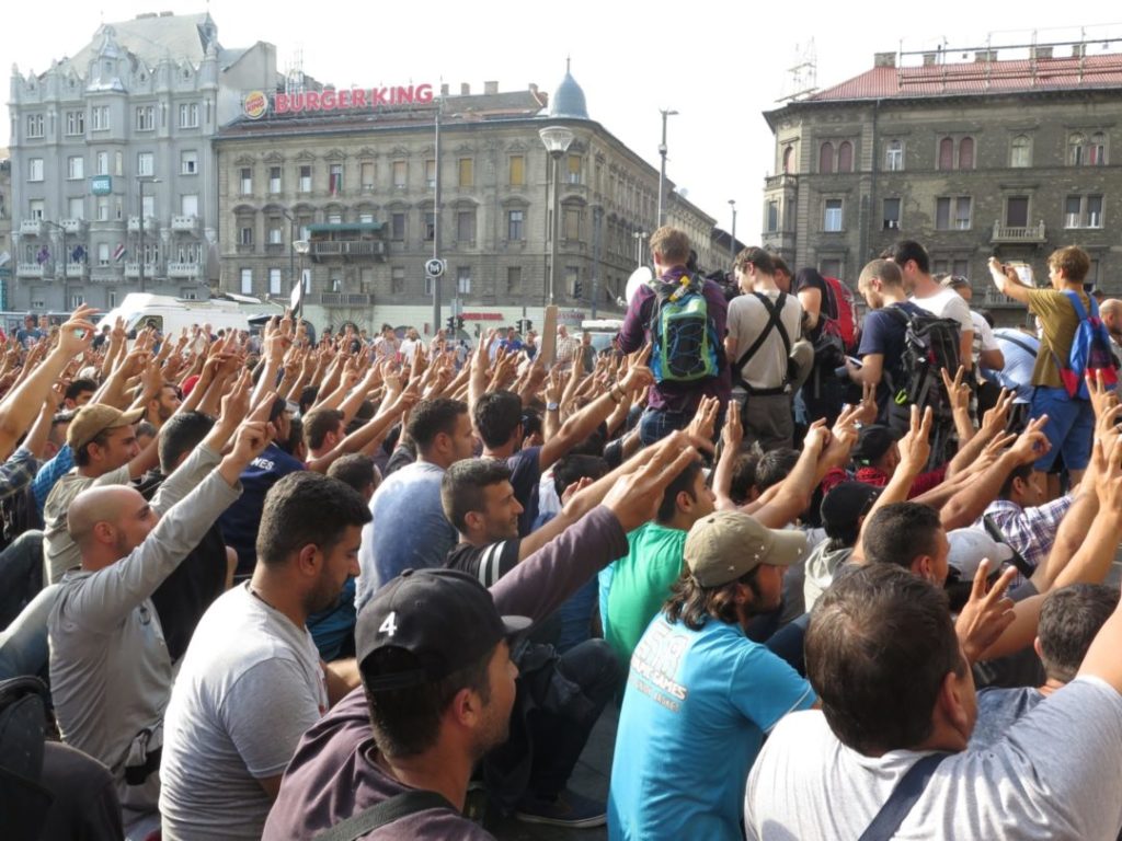 Refugees and migrants in Hungary protest at Keleti station
