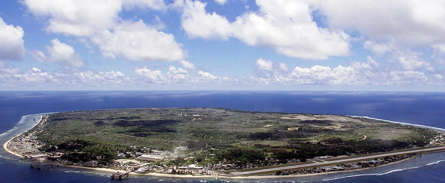 NAURU, NAURU:  The barren and bankrupt island state of the Republic of Nauru awaits the arrival of 521 mainly Afghan refugees, 11 September 2001 which have been refused entry into Australia.  The 25-square-kilometers of land encompassing Nauru has been devastated by phosphate mining which once made the Micronesian Nauruans the second wealthiest people per capita on earth.          AFP PHOTO/Torsten BLACKWOOD (Photo credit should read TORSTEN BLACKWOOD/AFP/Getty Images)