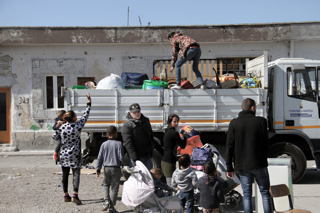 On 7 April 2017, the informal Romani settlement of Gianturco was forcibly evicted by local authorities in Naples, southern Italy. The community counted around 1,300 Romanian Roma, however many of them left the settlement in the days before the eviction due to repeated harrasment by authorities, feared how the eviction would be carried out and also were threatened with homelessness by authorities. On the day of the eviction, around 200/300 families were in the settlement. Around 130 of them were moved to a new segregated camp in Via del Riposo - where the previous camp was burnt down by unknown in 2011. Few families were offered as alternative a reception centre described " as a prison" by Roma themselves. Many others moved in temporarily with friends and related around Naples and outside, while others moved into existent informal settlements where they fear being forcibly evicted again. Few families are sleeping rough in their cars.