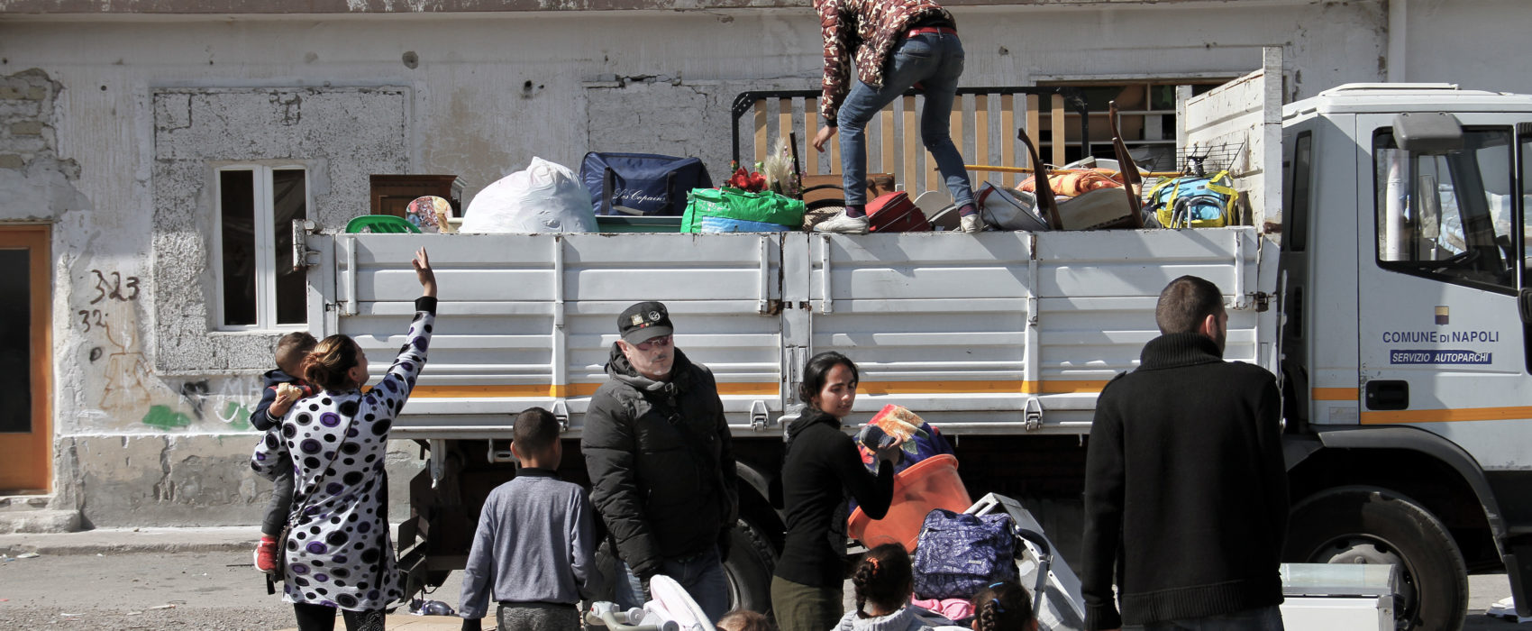 On 7 April 2017, the informal Romani settlement of Gianturco was forcibly evicted by local authorities in Naples, southern Italy. The community counted around 1,300 Romanian Roma, however many of them left the settlement in the days before the eviction due to repeated harrasment by authorities, feared how the eviction would be carried out and also were threatened with homelessness by authorities. On the day of the eviction, around 200/300 families were in the settlement. Around 130 of them were moved to a new segregated camp in Via del Riposo - where the previous camp was burnt down by unknown in 2011. Few families were offered as alternative a reception centre described " as a prison" by Roma themselves. Many others moved in temporarily with friends and related around Naples and outside, while others moved into existent informal settlements where they fear being forcibly evicted again. Few families are sleeping rough in their cars.