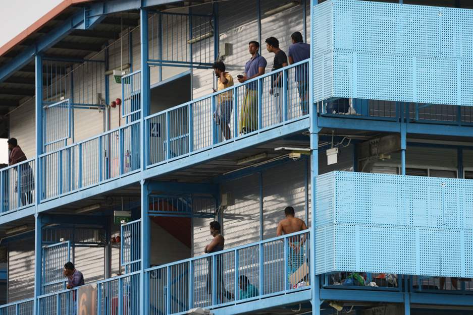 Singapore: Over 20,000 migrant workers in quarantine must be protected from mass infection