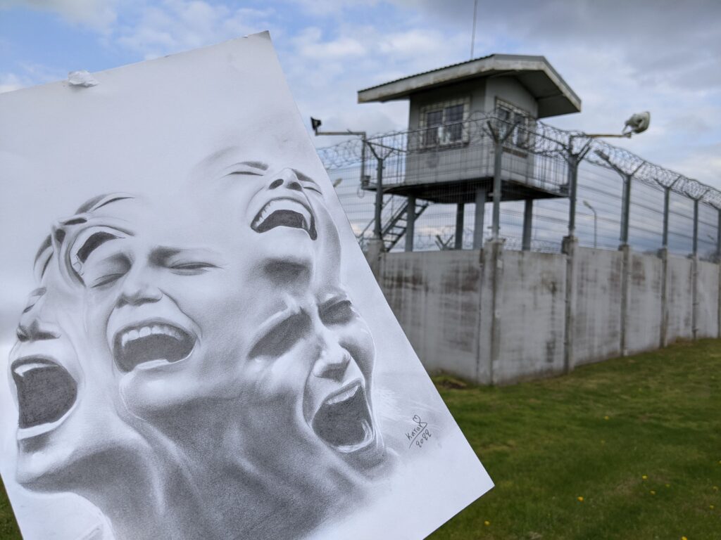 An artwork of screaming woman in front of a detention centre.
