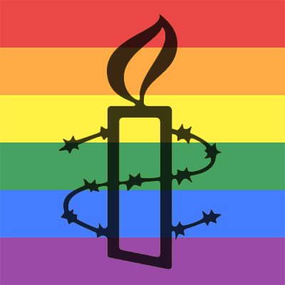 Rainbow flag and Amnesty candle