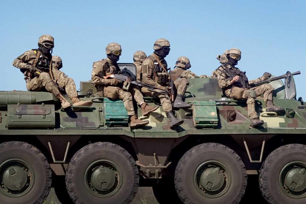 Ukrainian troops drive along a road on June 08, 2022 near Sloviansk, Ukraine