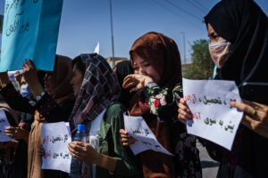 Rahila Talash, 27, weeps as she joined fellow protesters that are marching through the Dashti-E-Barchi neighborhood, a day after the Taliban announced their new all-male interim government with a no representation for women and ethnic minority groups, in Kabul, Afghanistan, Wednesday, Sept. 8, 2021.