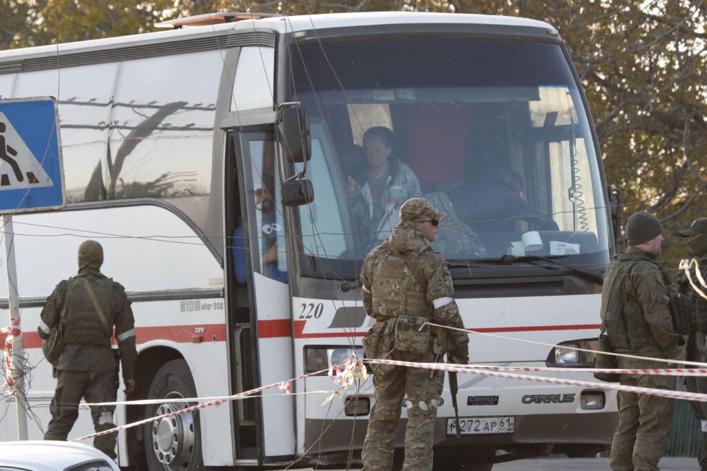 A bus taking people from Mariupol, Ukraine, arrives in the village of Bezimenne in Donetsk, 7 May, 2022.