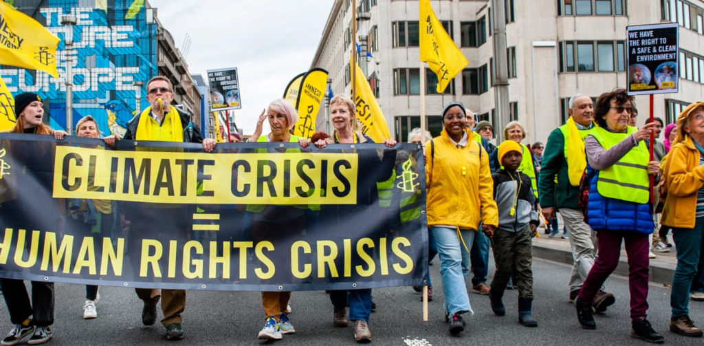 Protestors ahead of COP27 stand against climate change