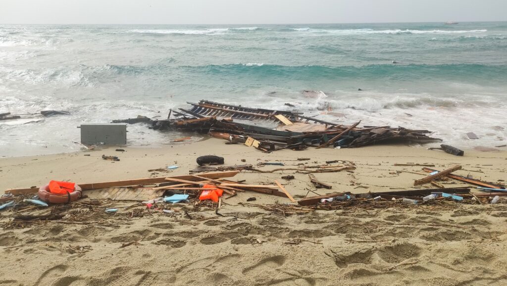 This photo obtained from Italian news agency Ansa, taken on February 26, 2023 shows debris of a shipwreck washed ashore in Steccato di Cutro, south of Crotone, after a migrants' boat sank off Italy's southern Calabria region. - More than 40 migrants, including a tiny baby, died after their overloaded boat sank early on February 26, 2023 in stormy seas off Italy's southern Calabria region, Italian media and rescue services reported.