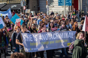 March for choice in Dublin, Ireland, 26 September, 2015. Over 150 people gather on the millenium bridge to #light the way to the global goals.