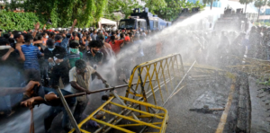 Protestors are attacked by water cannons