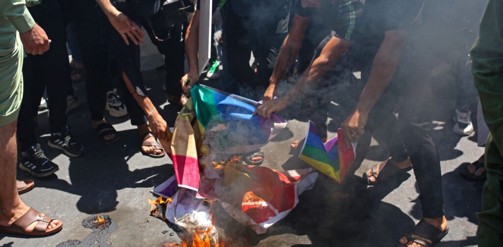The burning of a rainbow flag in Iraq