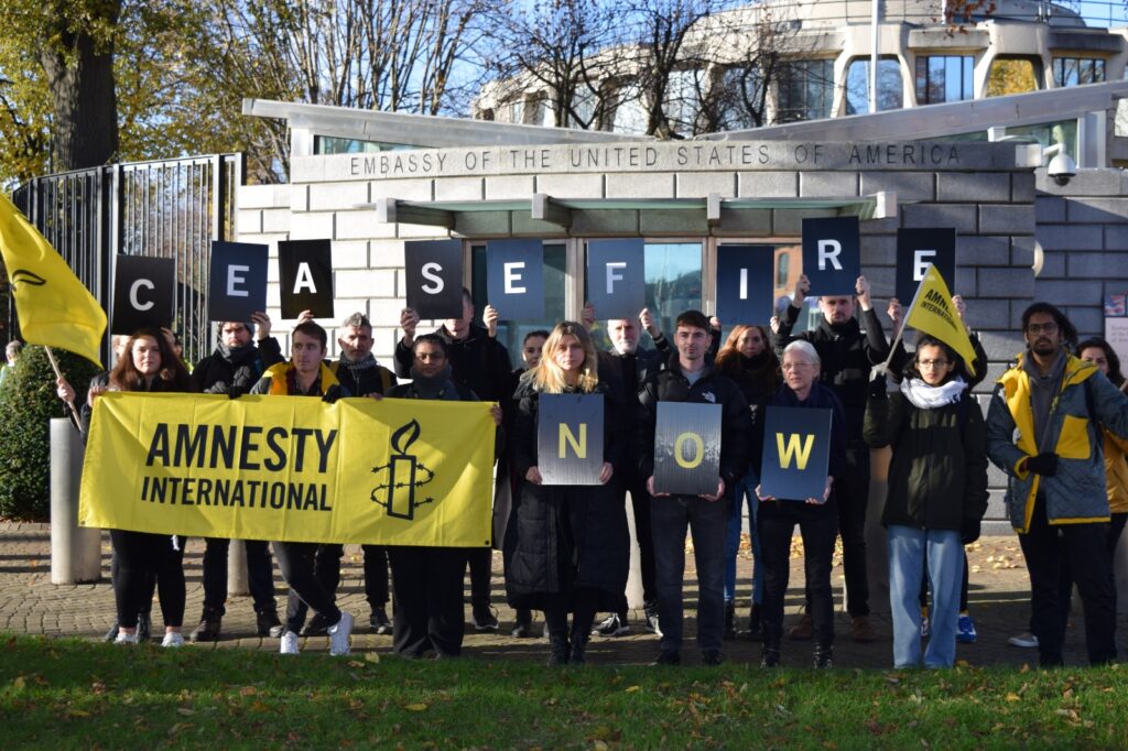 Amnesty activists call for a ceasefire now in Palestine in front of the US Embassy